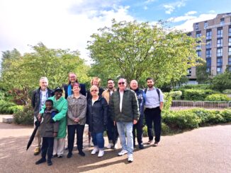 Woodberry Downs Greenery looking at its best in sunshine under a blue sky for Mayor Garbett's visit.
